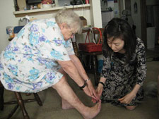 elderly woman stretching