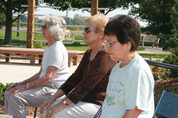 women sitting on a bench